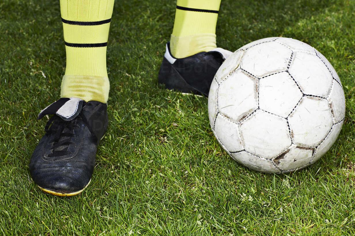Legs Of A Soccer Player Close Up Stockphoto