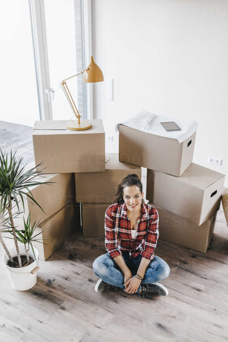 Mature Woman Moving House Sitting On Floor Thinking Josf Joseffson Westend61