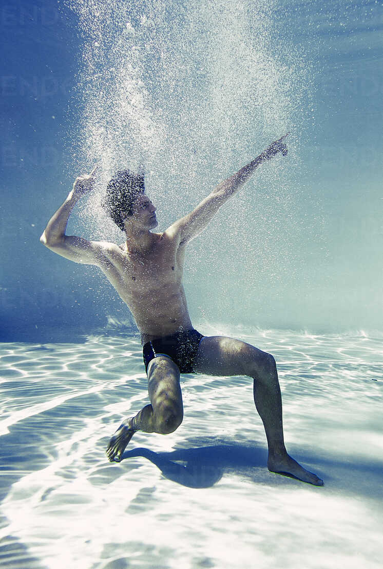 Man Posing Underwater In Swimming Pool Caif Robert Daly Westend