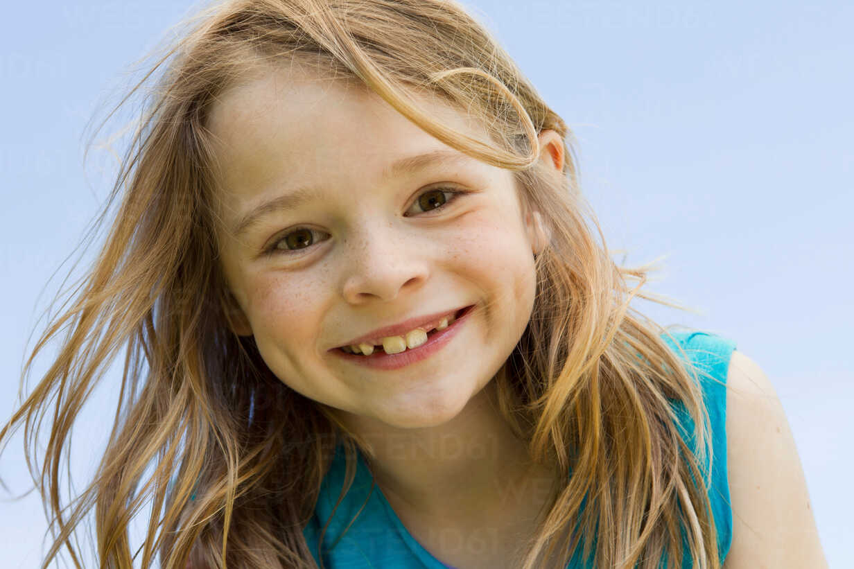 Close Up Of Girls Smiling Face Stockphoto