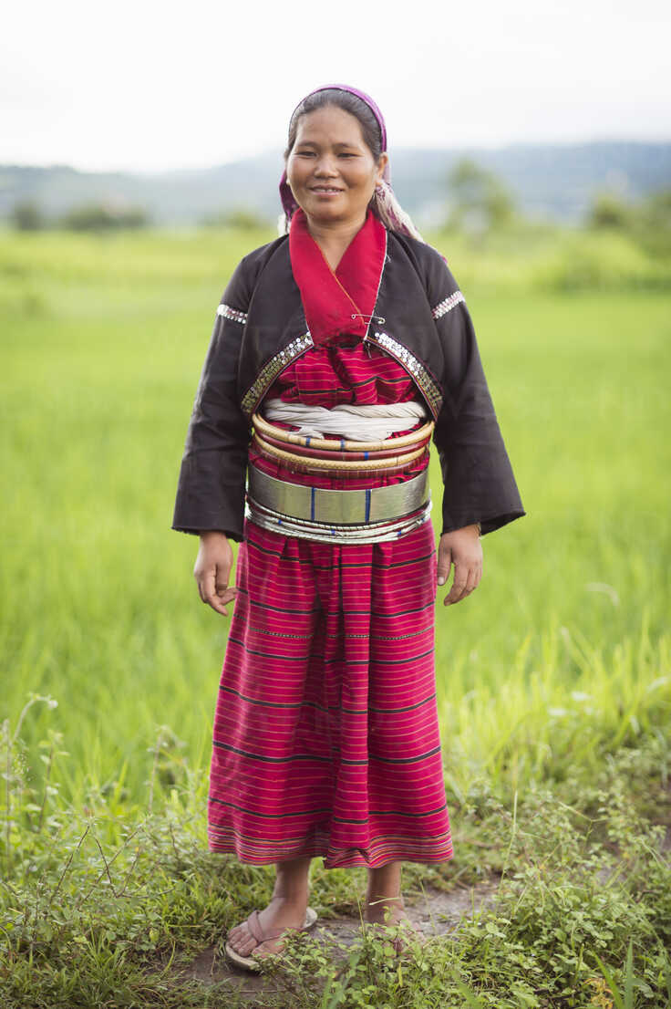 Portrait of mid adult woman in traditional clothing, Shan State, Keng ...