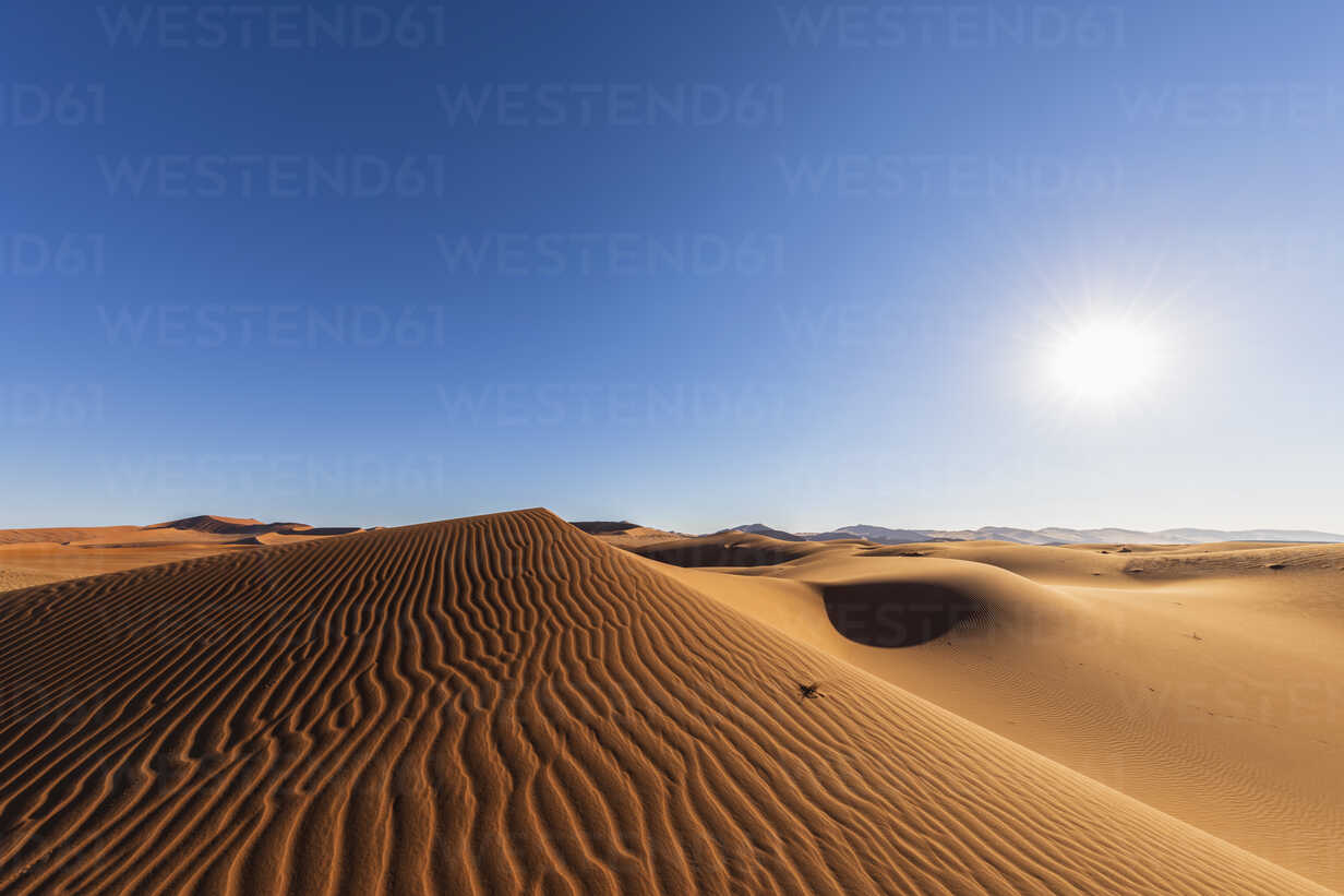 Africa Namibia Namib Desert Naukluft National Park Sand Dunes Against The Sun Stockphoto