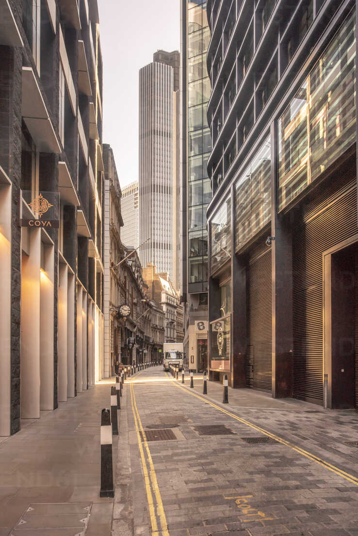 Uk London Narrow Street In The City Of London Financial District With Skyscrapers In The Background