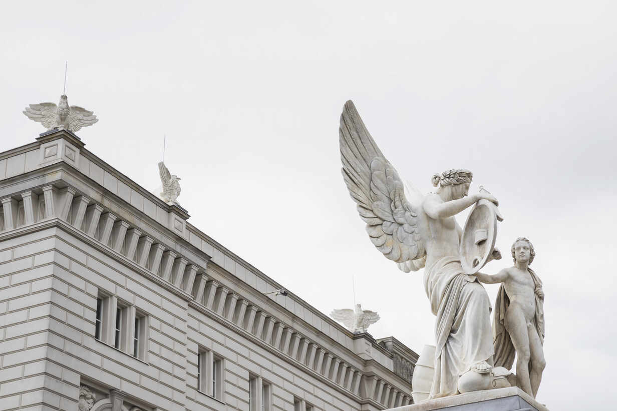 Germany Berlin Nike Instructs Boy In Heroic History Statue With Humboldt Forum Museum In Background Gwf