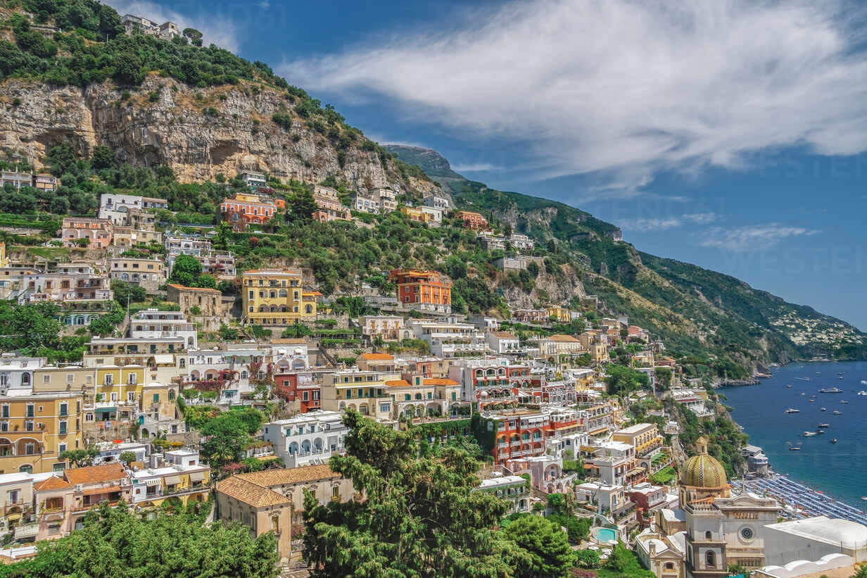 Sunny View Of Positano Low Rise Buildings With Church And Cliffs Positano Costiera Amalfitana Amalfi Coast