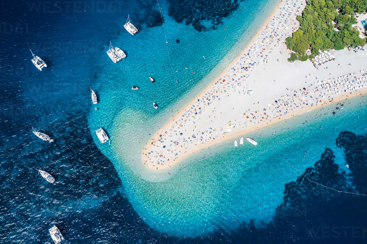 Aerial View Of Tourists And Boats On The Shore Of The Beach In Bol Croatia Stockphoto